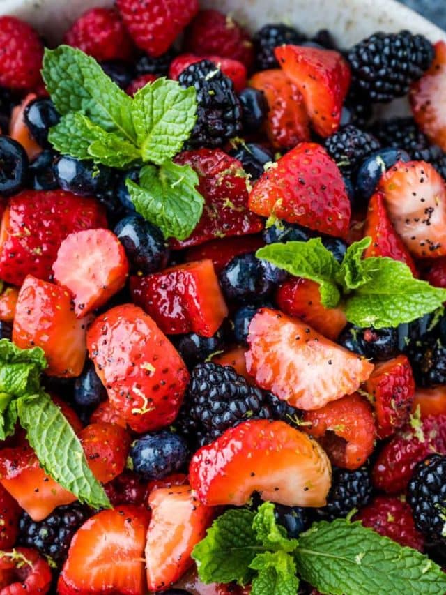 Pin4 for the Summer Berry Fruit Salad- a closeup of all the berries in a white bowl.