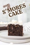 Easy s'ores cake recipe image for Pinerest featuring a slice of the sheet cake.