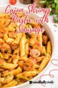 A close-up of a bowl of Cajun Shrimp Pasta with Sausage.