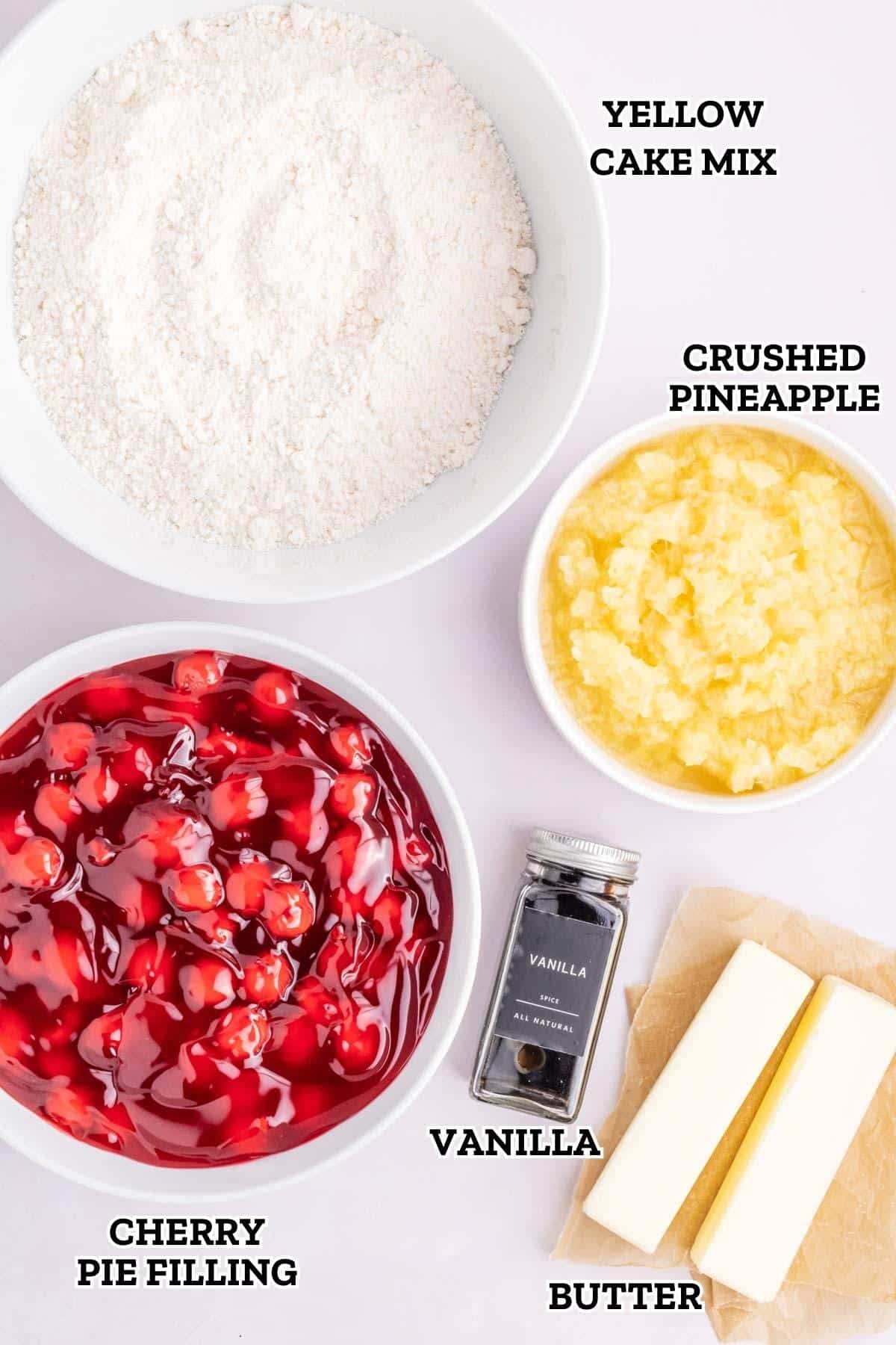 A labeled image of cherry pineapple dump cake ingredients.