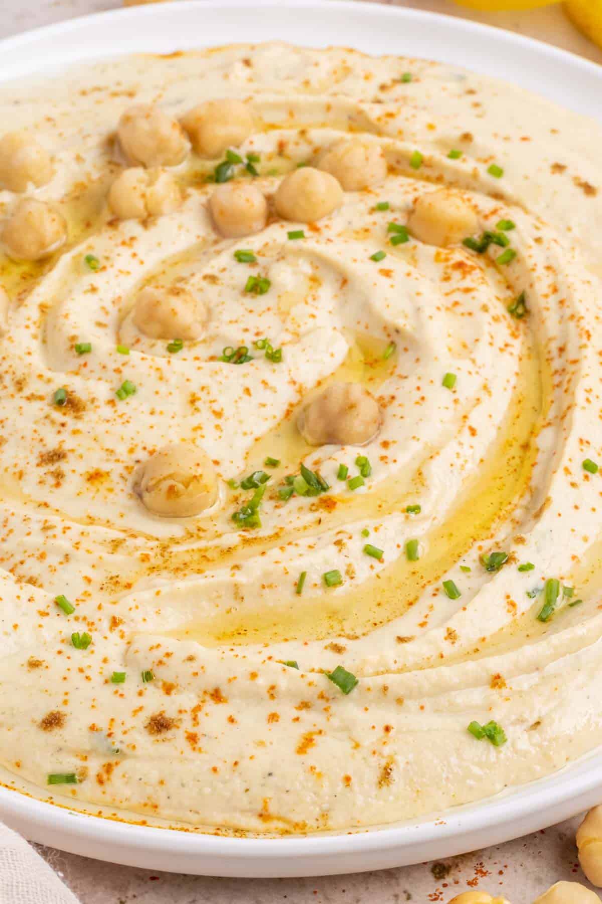 An up close image showing the texture of garlic hummus.