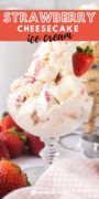 A glass dessert cup filled with strawberry cheesecake ice cream with text for pinterest.