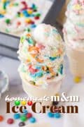 Homeade M&M Ice Cream in a cake cone picture close up and full of colorful candies.