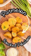 A Pinterest image with text and an overhead shot of wooden plate of parmesan roasted potatoes.