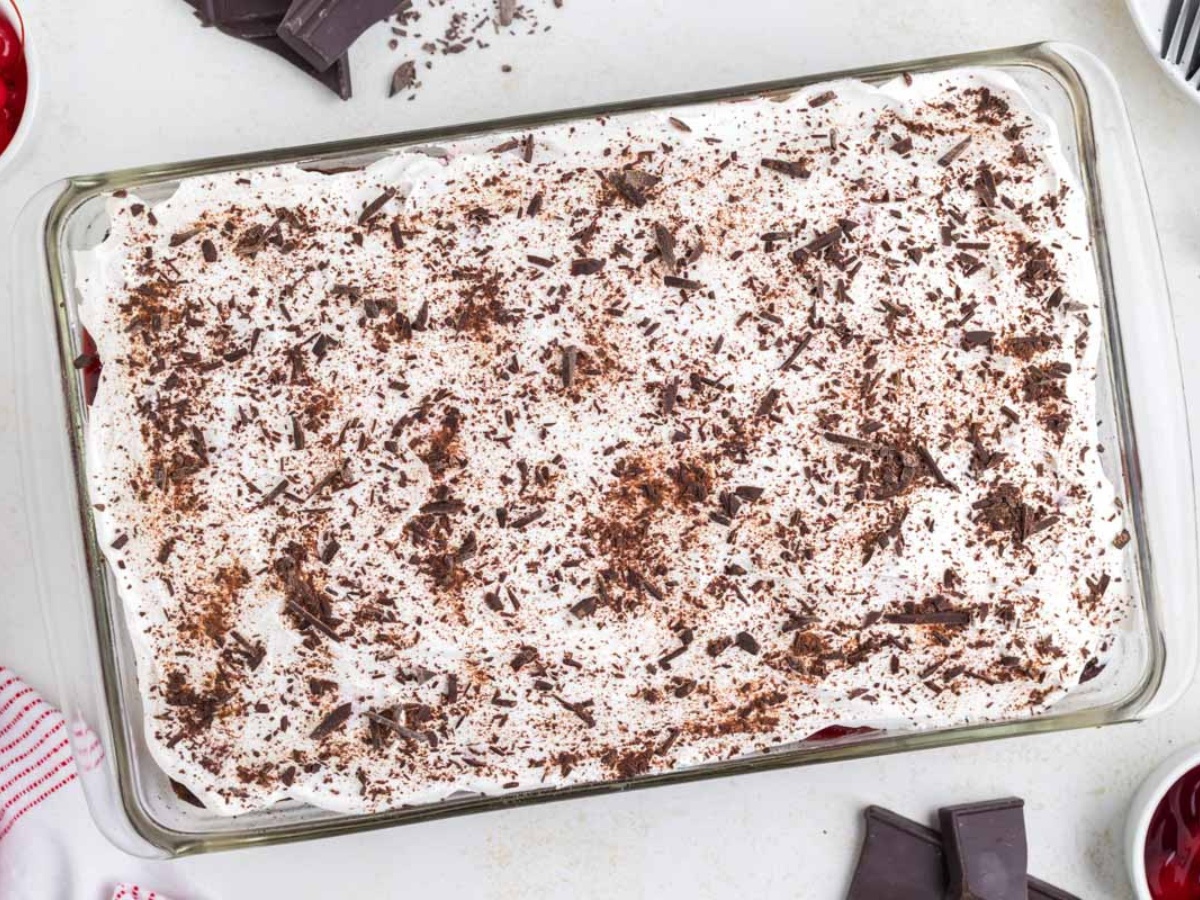 Chocolate shavings added to whipped topping layer.