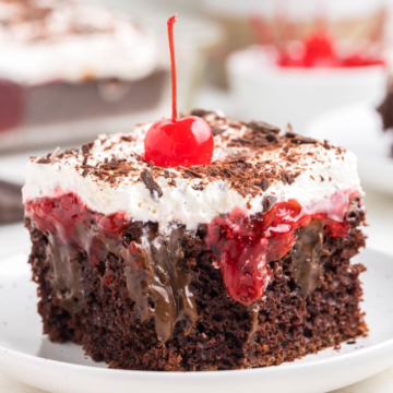 A slice of black forest poke cake.