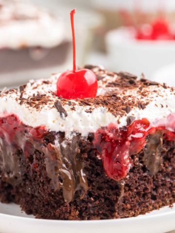 A slice of black forest poke cake.