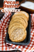 Pinterest image of chewy pecan butter cookies on a silver tray.