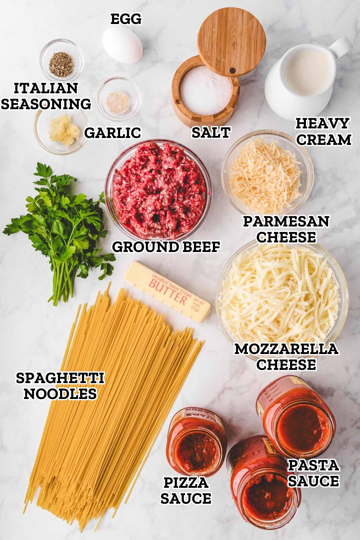 A labeled image of ingredients needed to make ultimate baked spaghetti casserole.