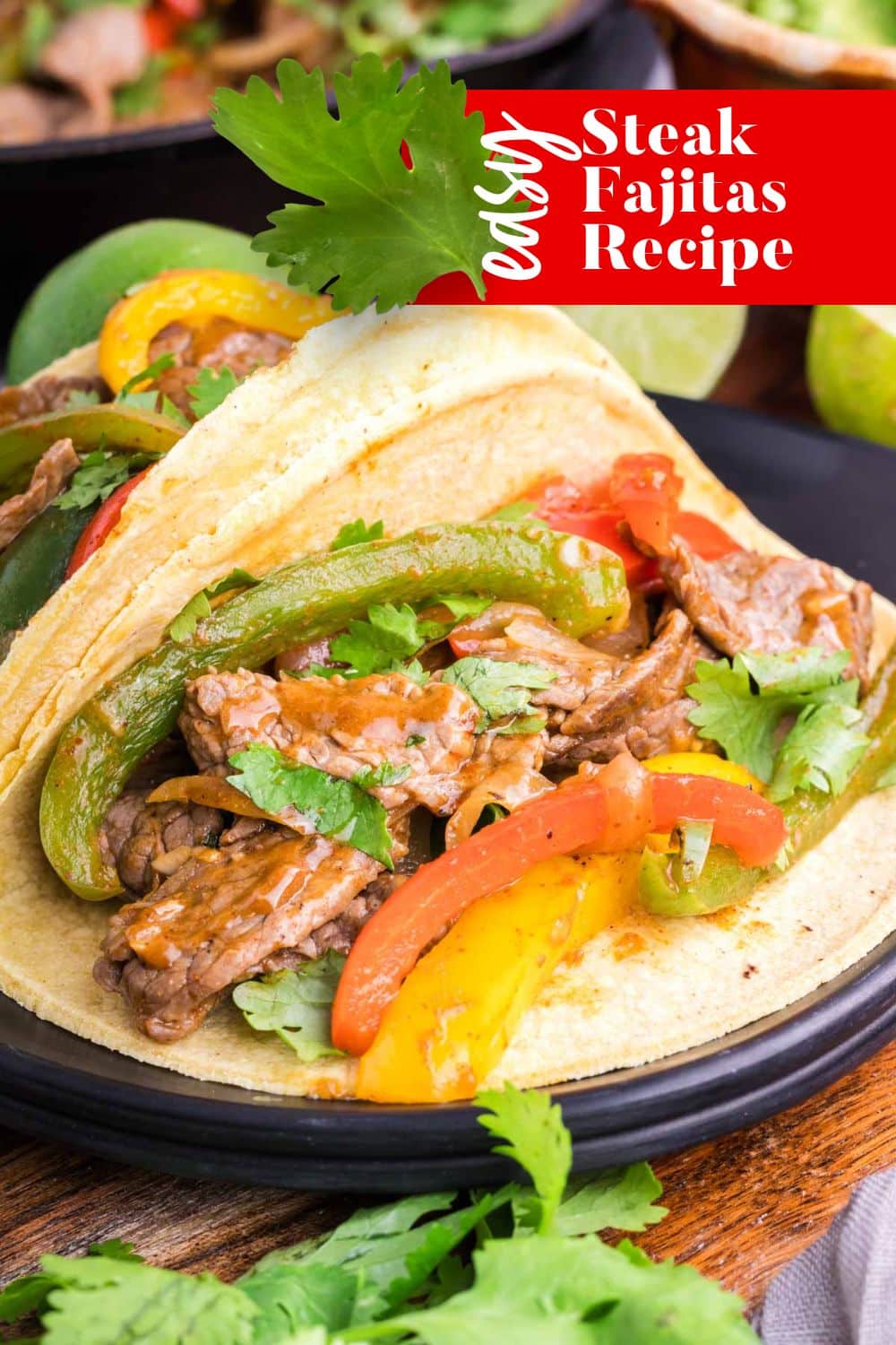 easy stek fajitas recipe with a corn tortillas spilling with ingredients.