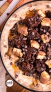 Image of the trifle bowl filled with layers of the dessert shot from overhead to reveal tall the yummy chocolate toppings.