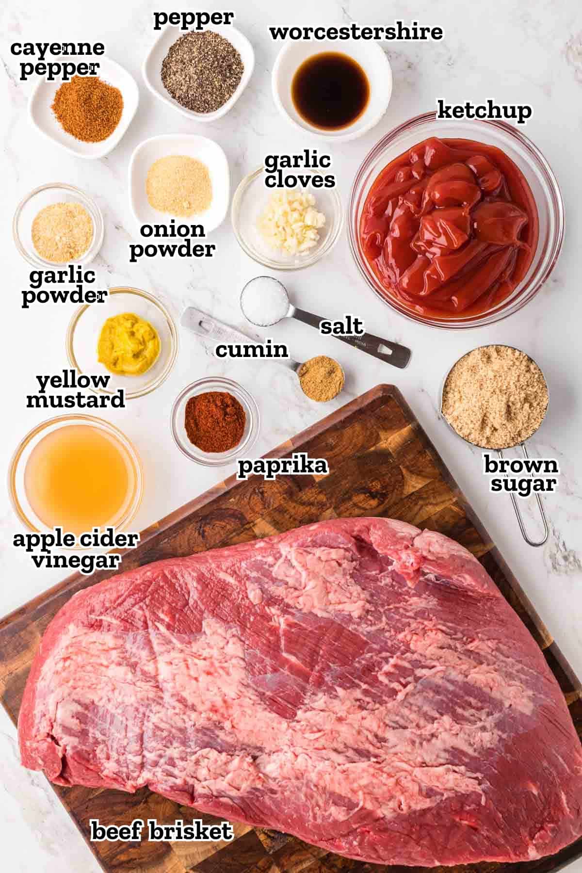 Labeled ingredients needed to make slow cooker beef brisket with bbq sauce.