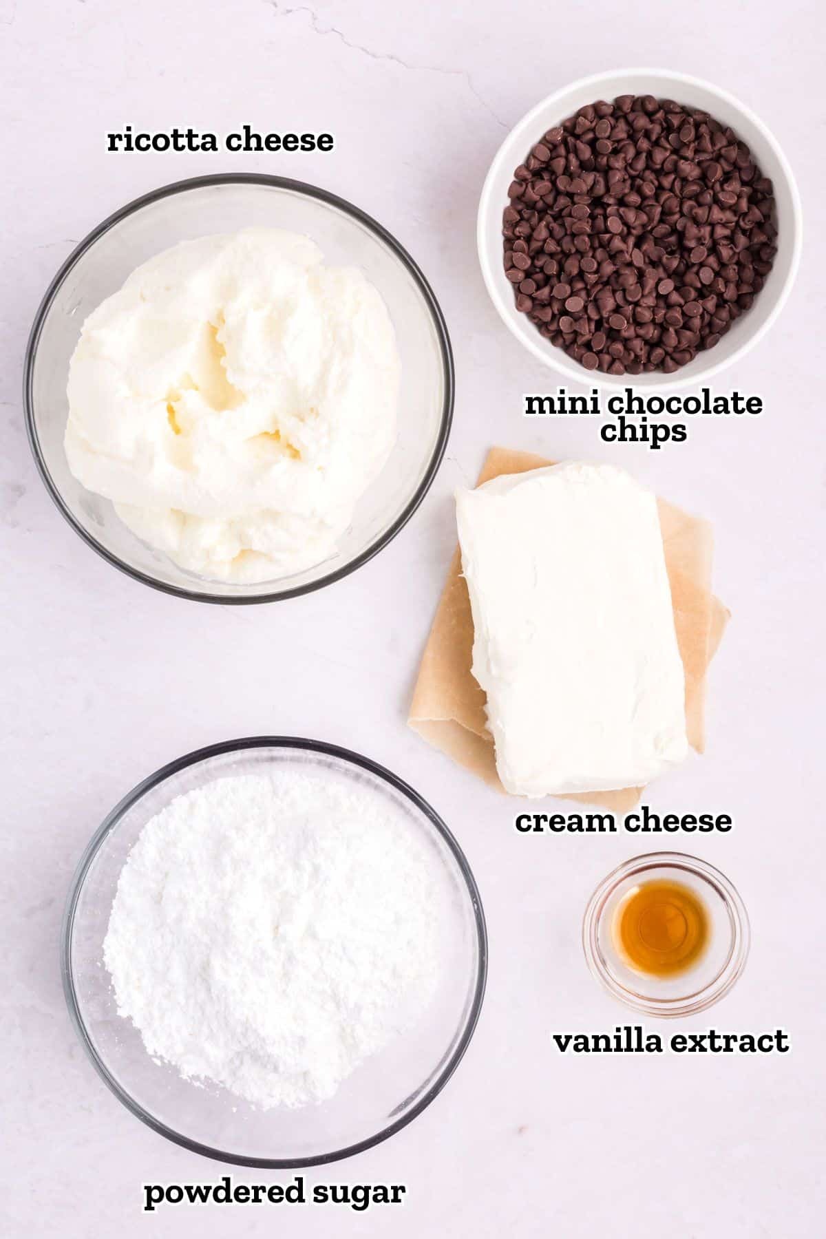 Labeled ingredients needed to make a cannoli dip.