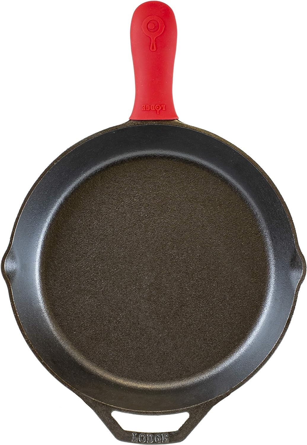 Lodge cast iron skillet with red silicone handle.
