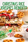 Christmas Rice Krispies Treats image showing a stack of two showing the side, stuffed with sprinkles.
