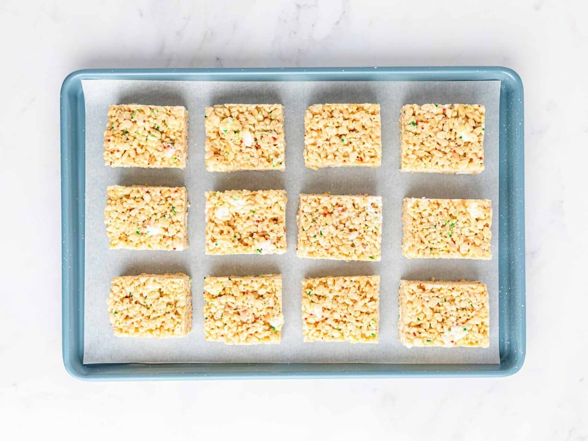 A tray of cut rice krispie treats.