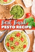 A bowl of pasta tossed with pesto and garnished with cherry tomatoes.