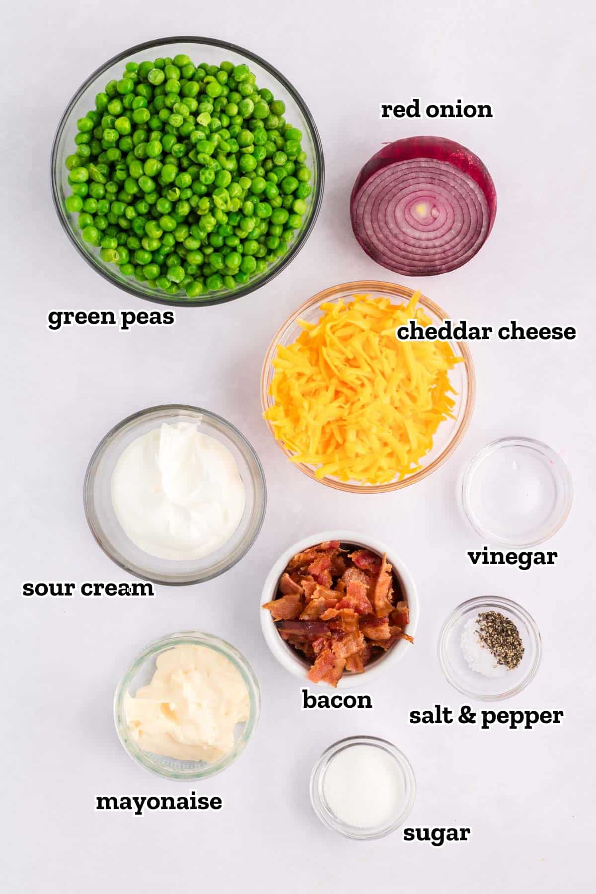 A labeled image of ingredients needed to make green pea salad.
