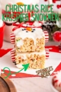 Christmas rice krispie treat snowmen in a stack of two.