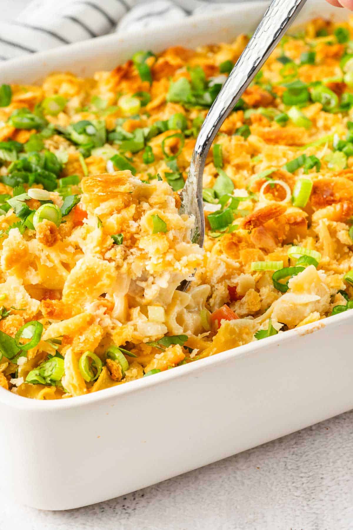 Chicken Noodle Casserole in a white casserole dish.