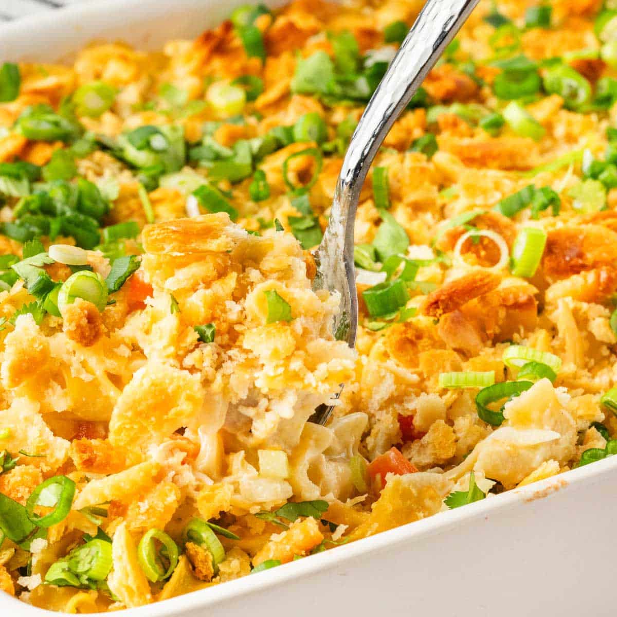 Chicken Noodle Casserole in a white casserole dish.