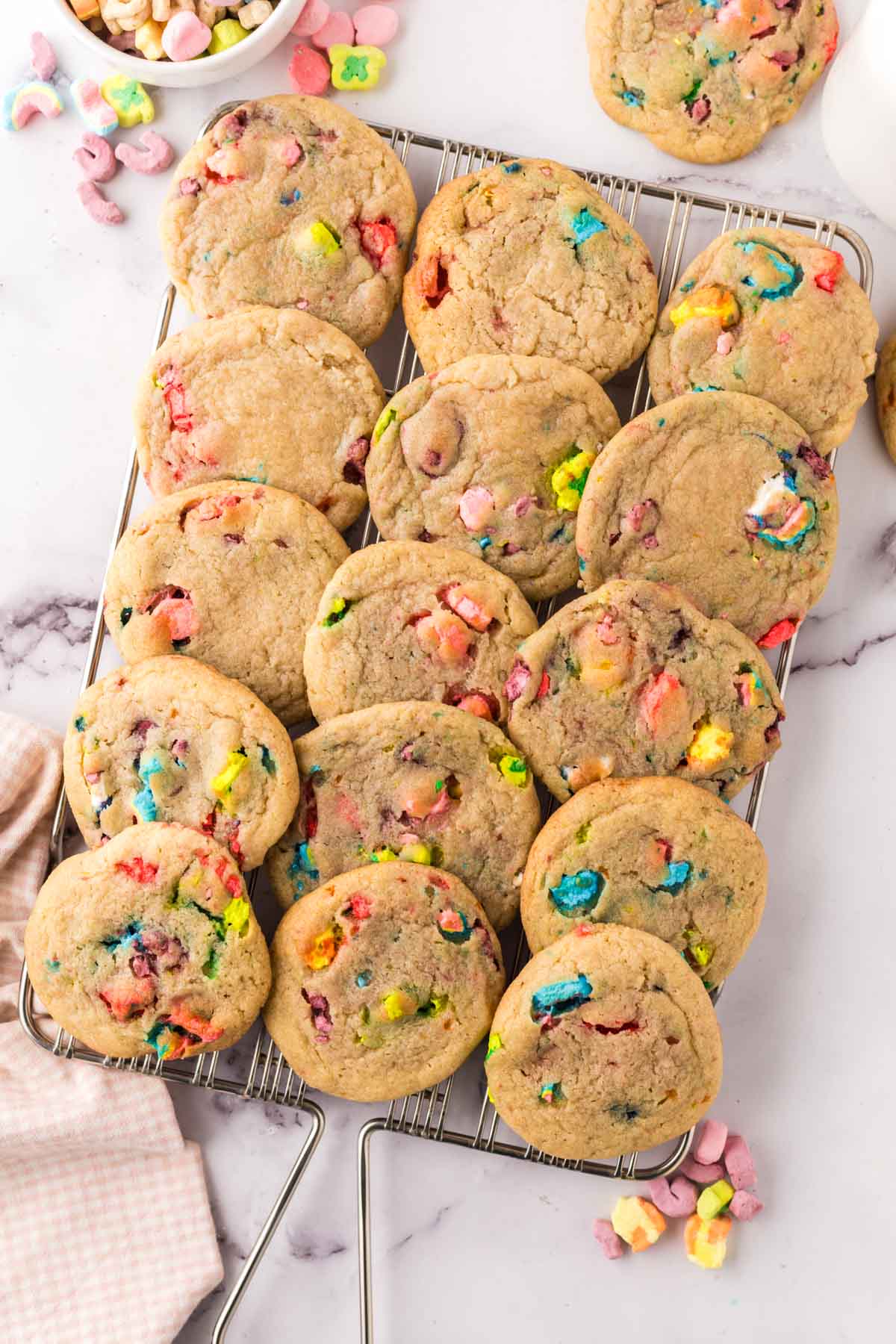 Lucky Charms cookies on a cooling rack.