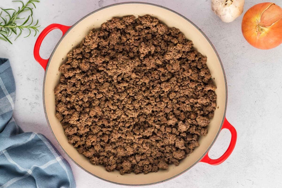 Ground beef cooked in a skillet.