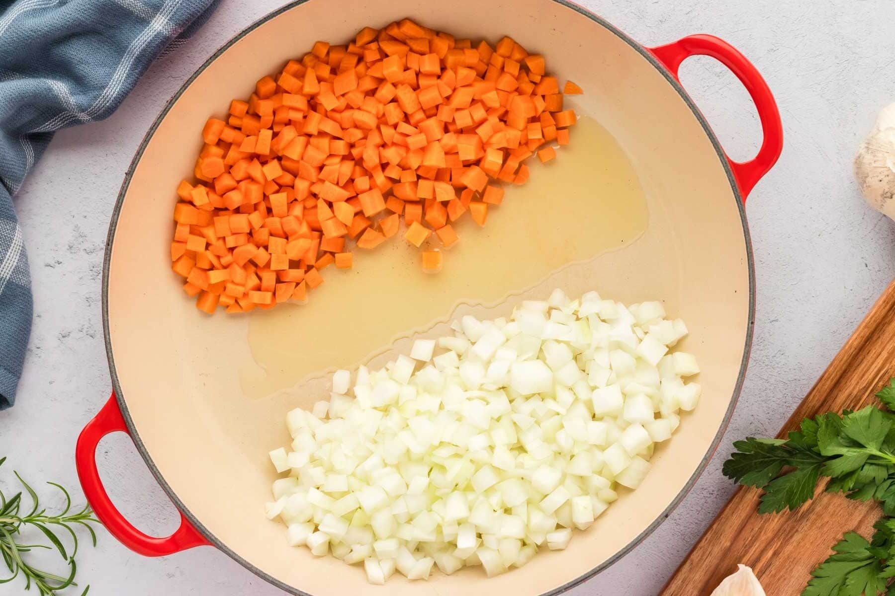 Carrots and onions added to the dutch oven.