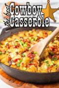 The best Cowboy Casserole recipe is featured topped with golden tots and, cheese and bacon, cooked in a skillet.