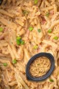 An overheadshot of the Buffalo Chicken Pasta Recipe with a featured image of the crockpot full superimposed.
