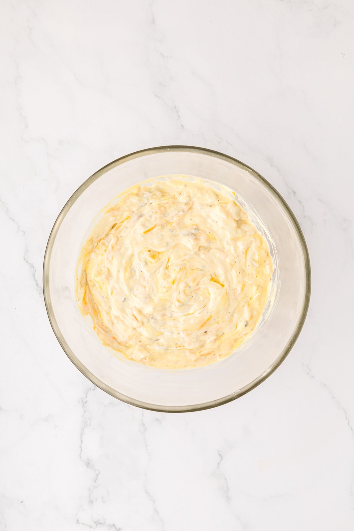 Filling ingredients  stirred together and combined in a bowl.