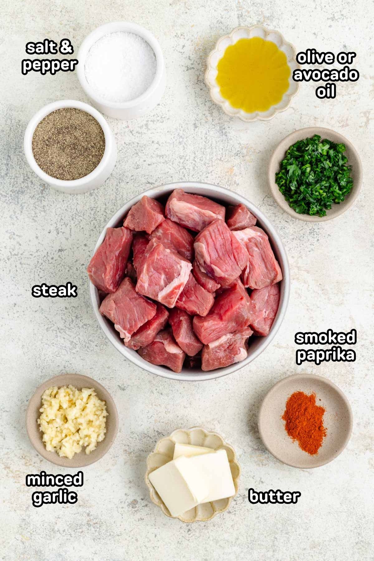 A labeled image of ingredients needed for garlic butter steak bites.