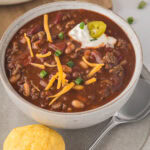 Bowl of Chili made with bloody Mary mix.
