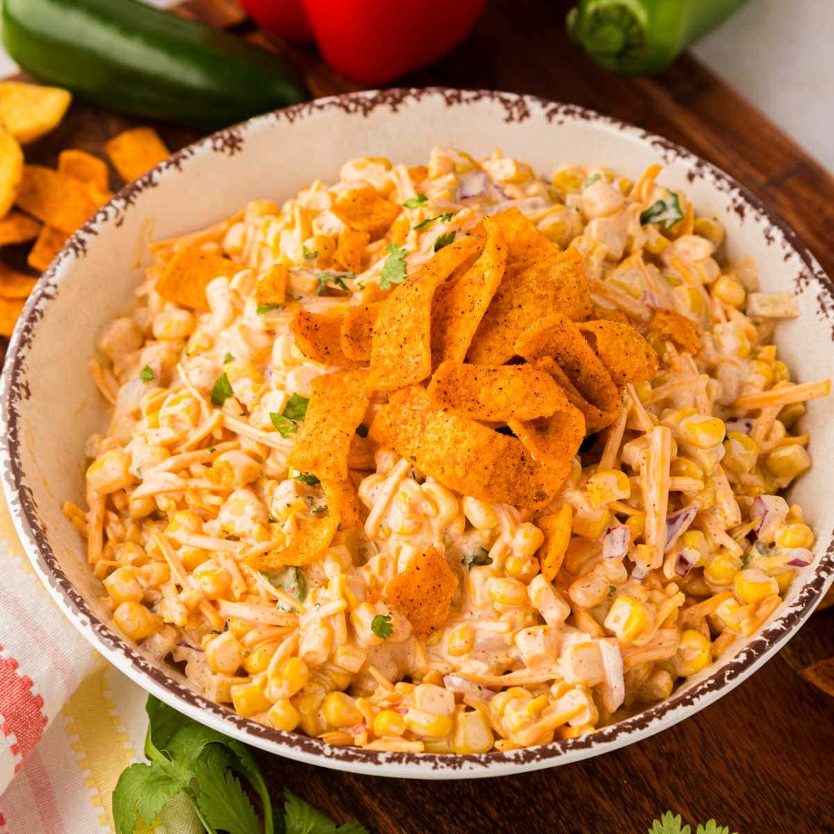 Corn Salad with Fritos in a textured bowl.