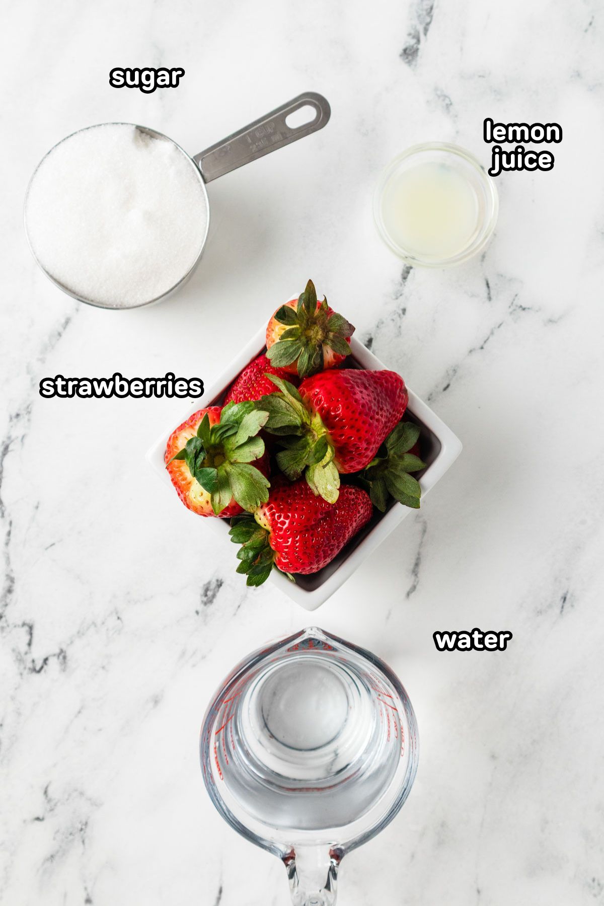 Labeled photo of the ingredients needed to make homemade strawberry syrup.