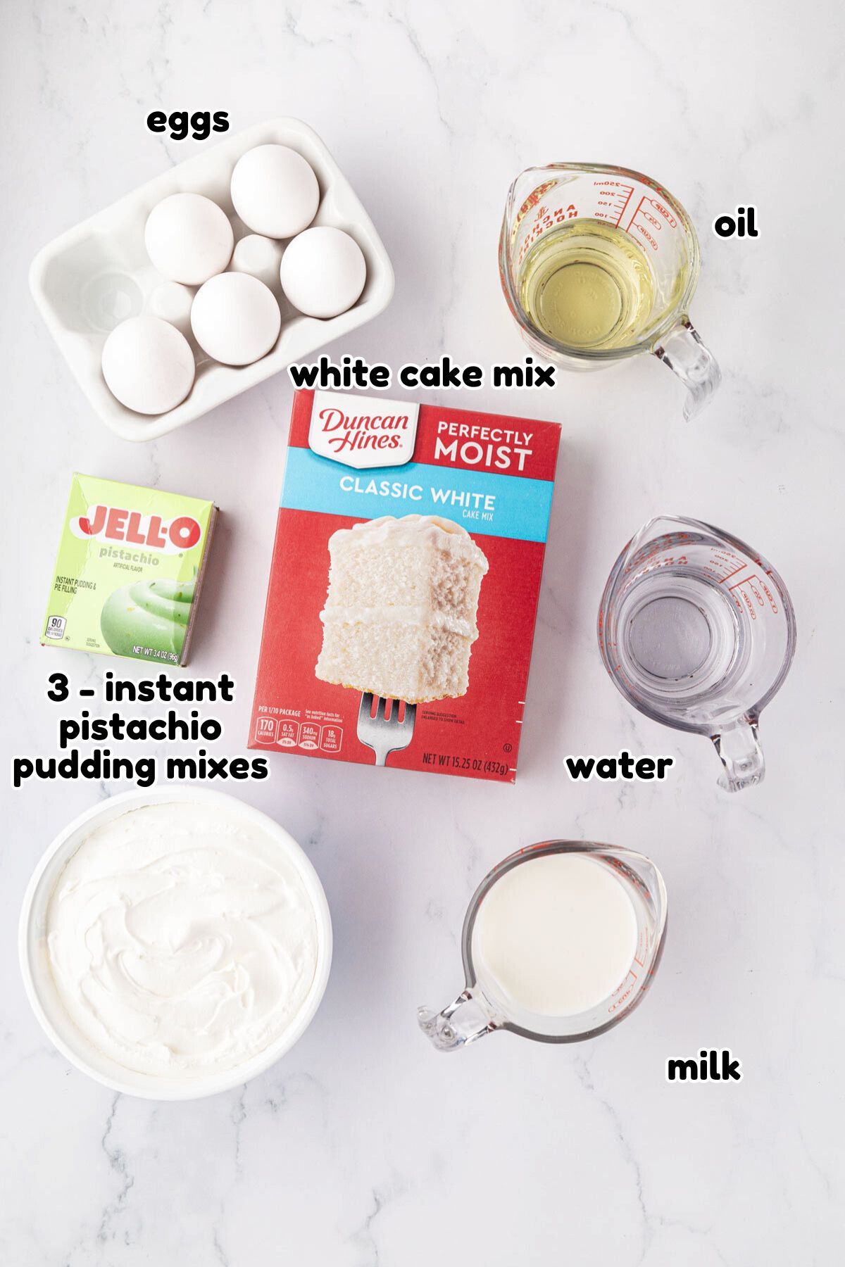 Labeled ingredients needed to make Pistachio Cake Recipe.