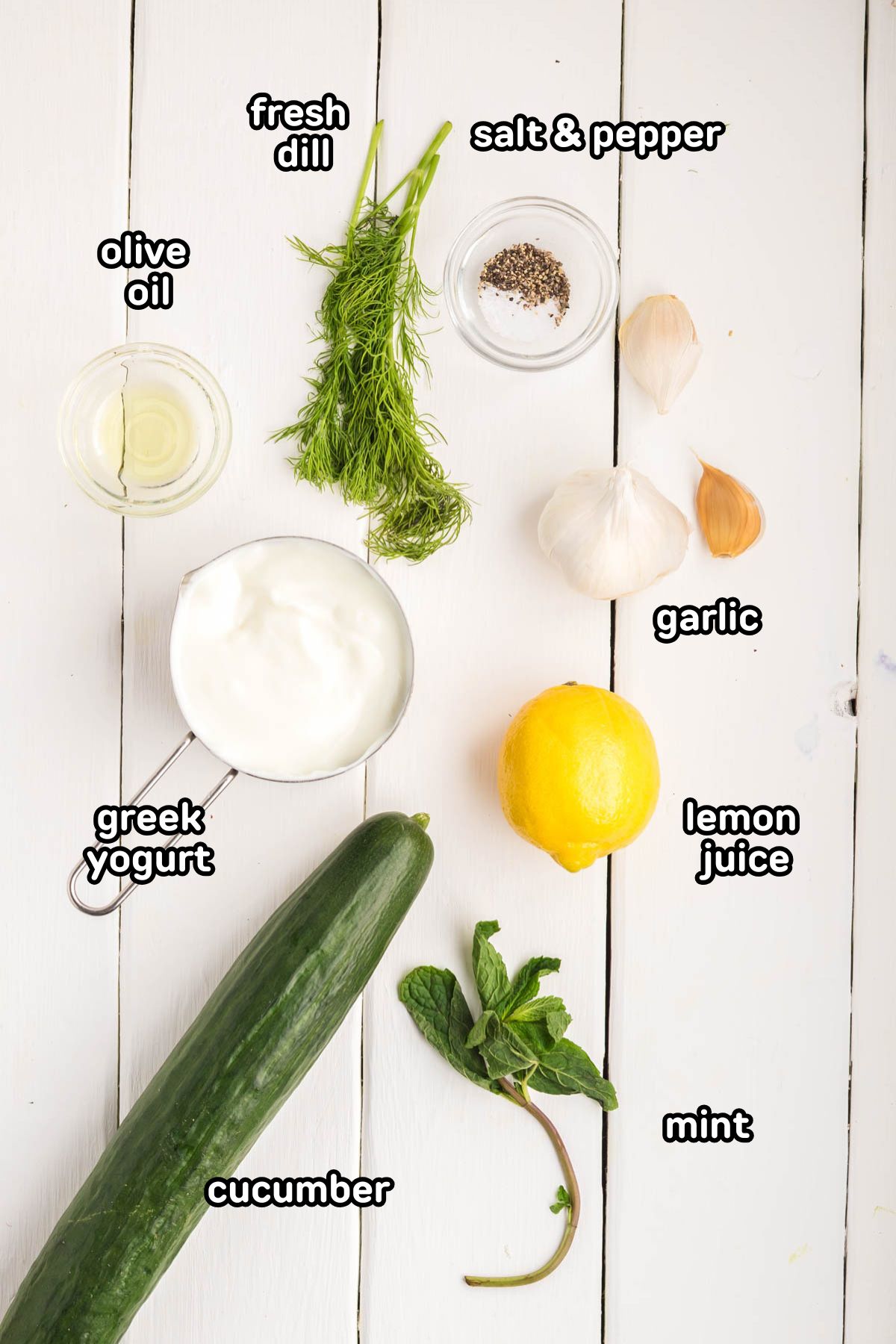 Ingredients needed to make homemade tzatziki sauce.