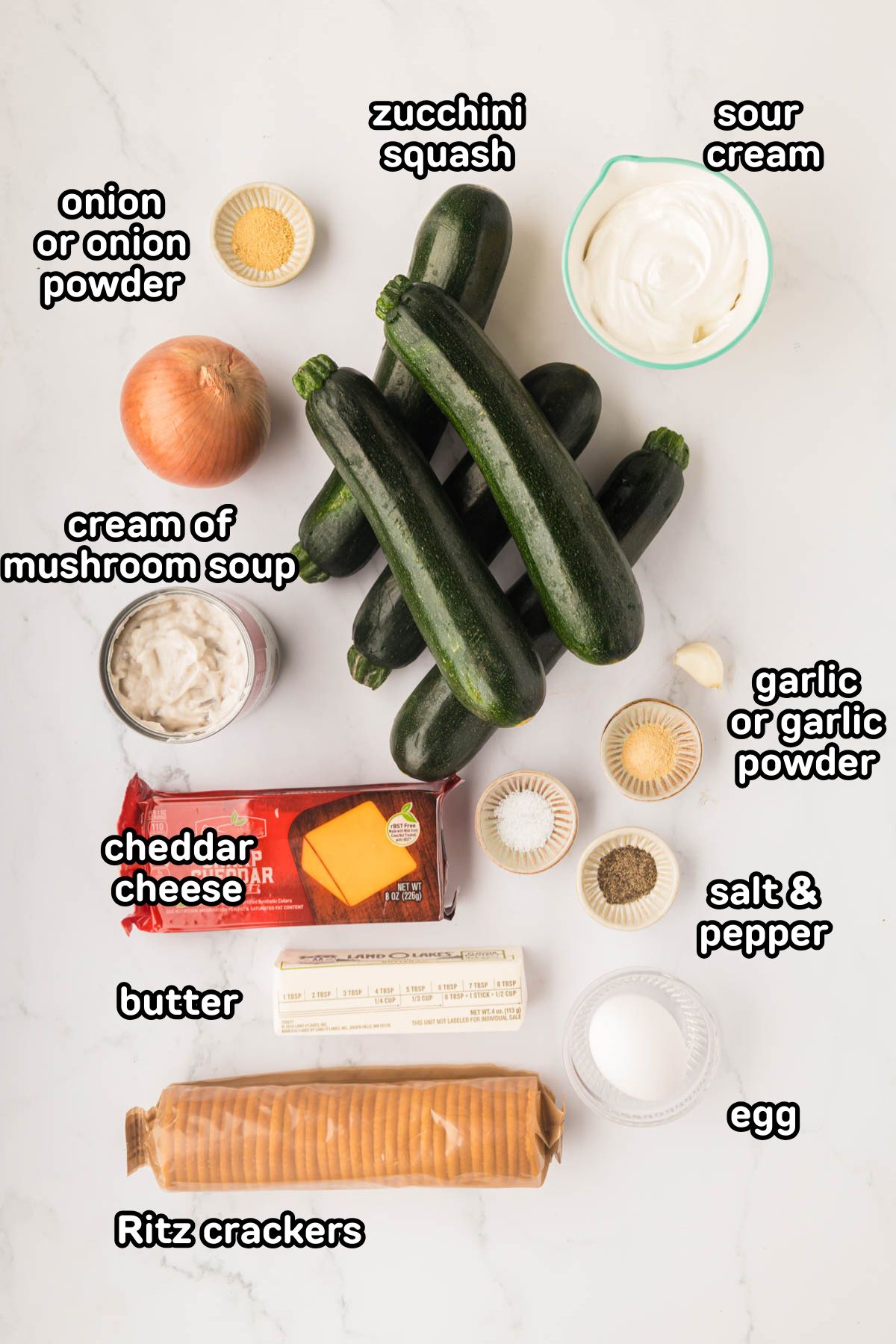 Labeled photo of the ingredients needed to make zucchini casserole.
