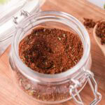 Elote seasoning in a glass jar.