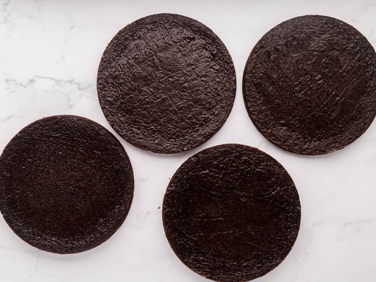 Triple chocolate cake after being baked in 9 inch round pans.