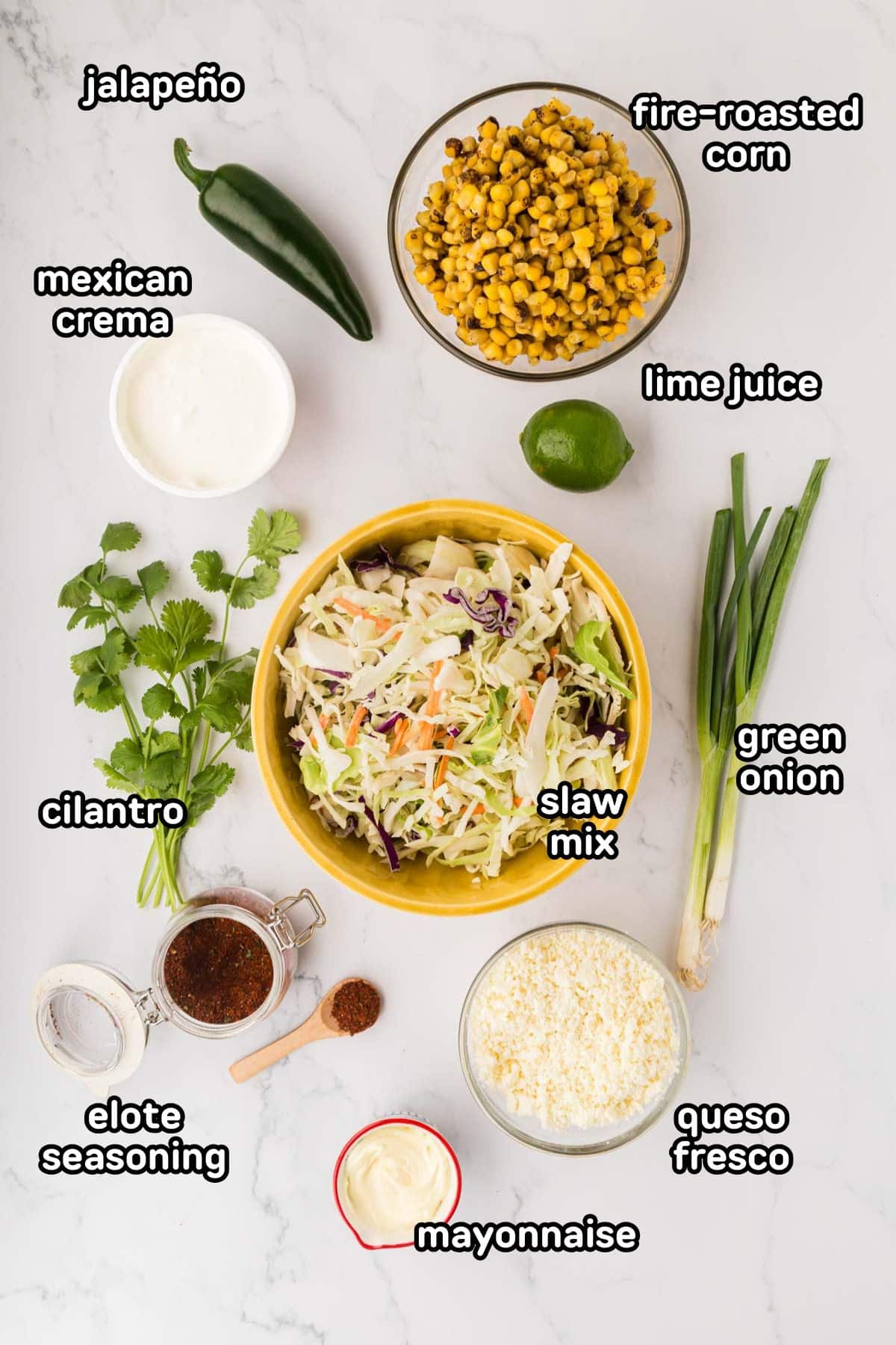 Labeled ingredients needed to make Mexican street corn soleslaw.