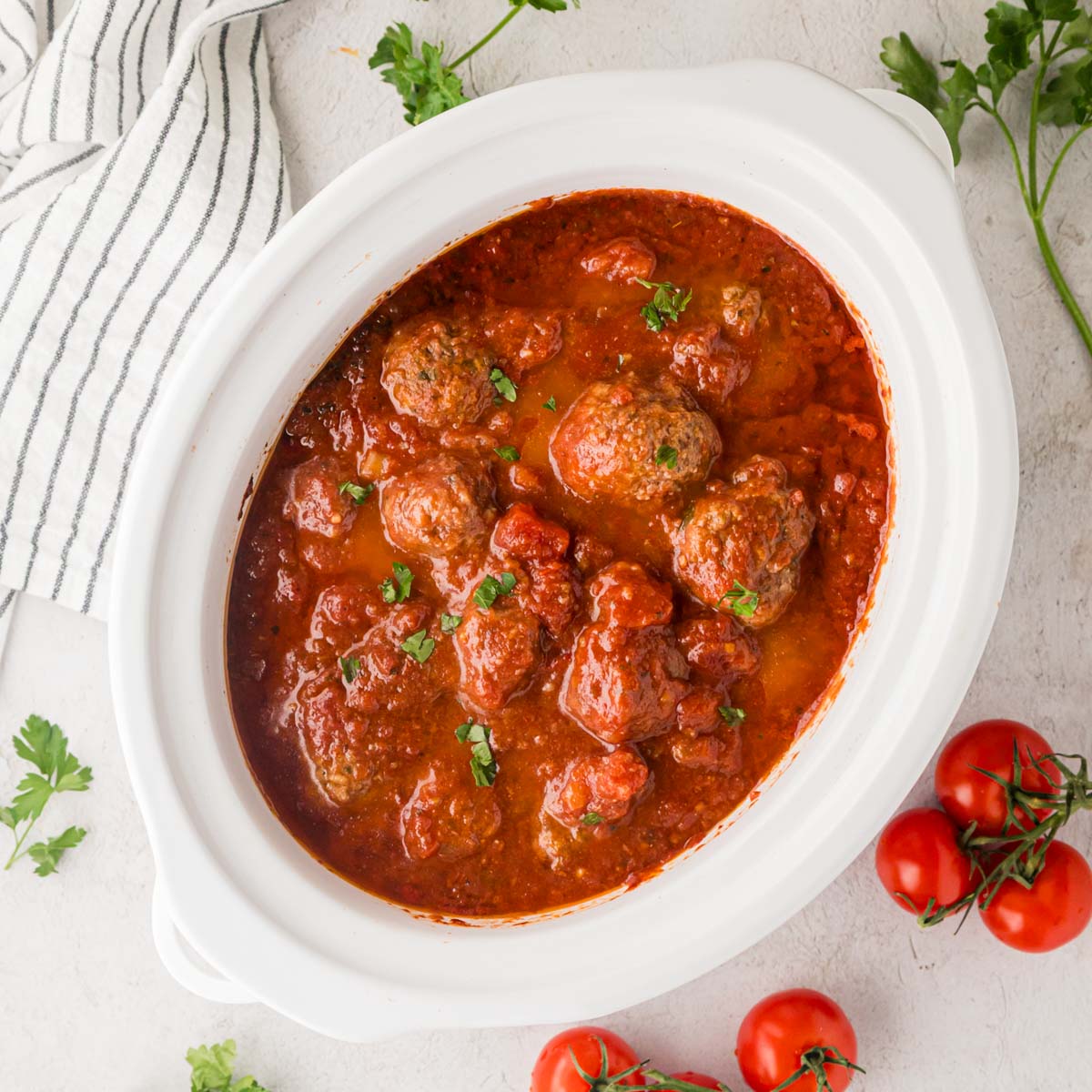 Overhead shot of slow cooker Italian meatballs in the slow cooker.