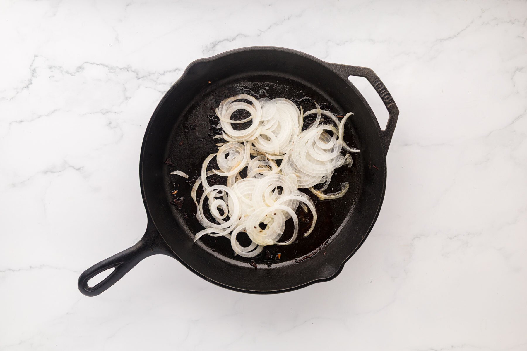 Onions in a skillet.