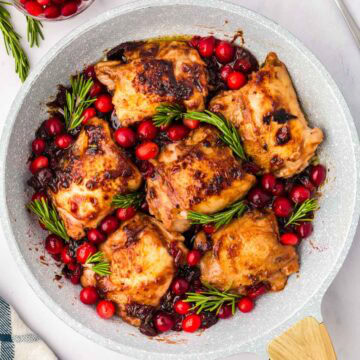Close up of the balsamic cranberry chicken in a skillet.