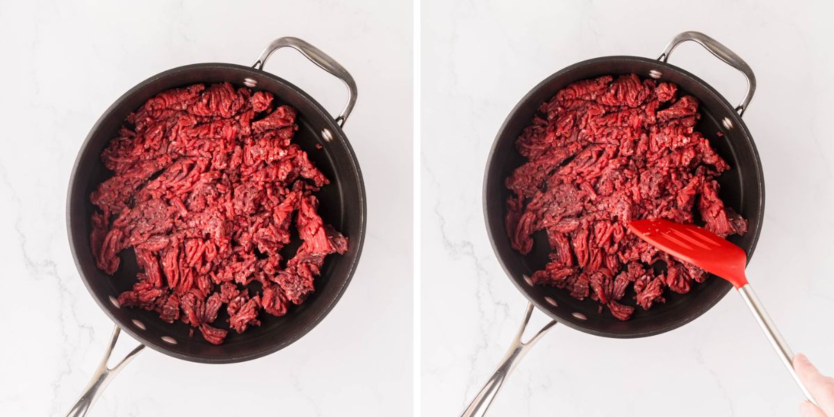 Crumbling ground beef in a skillet with a spatula.