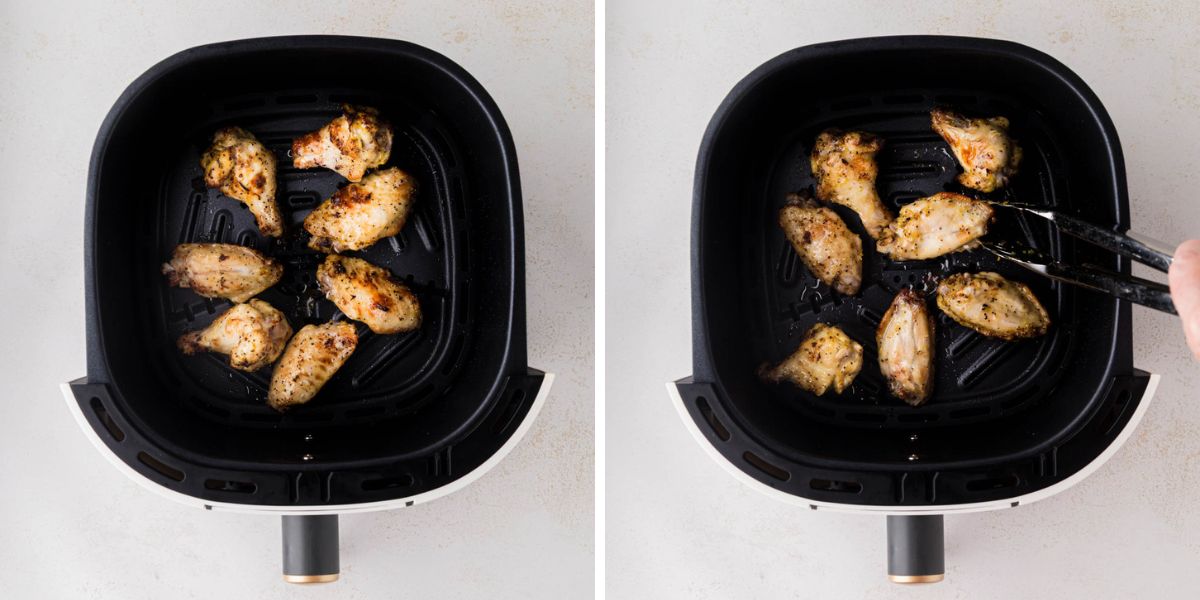 Chicken wings in air fryer after cooking halfway.