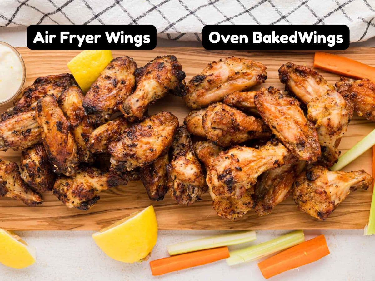 Chicken wings on a wooden board.