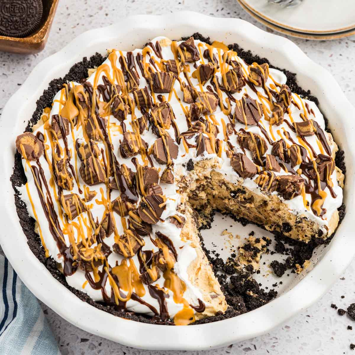 A no-bake peanut butter pie in a pie dish.