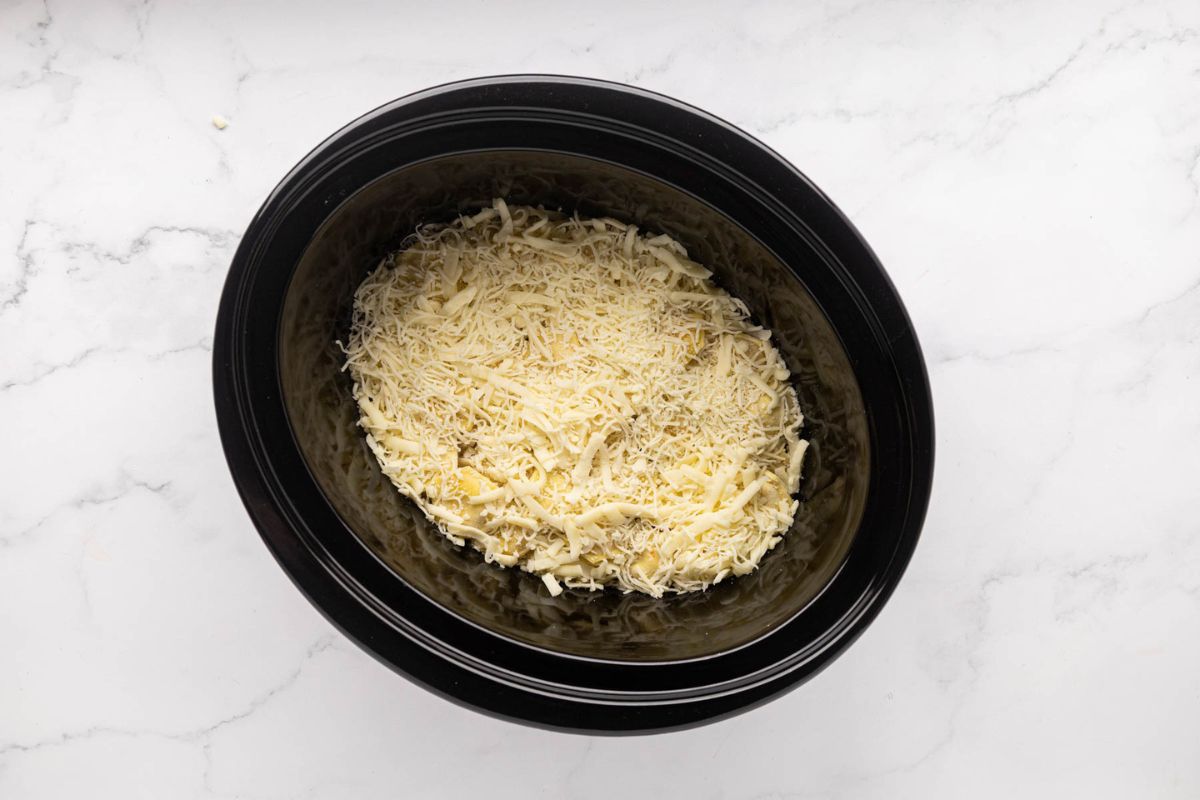 First layer of cheese on top of ravioli. OK