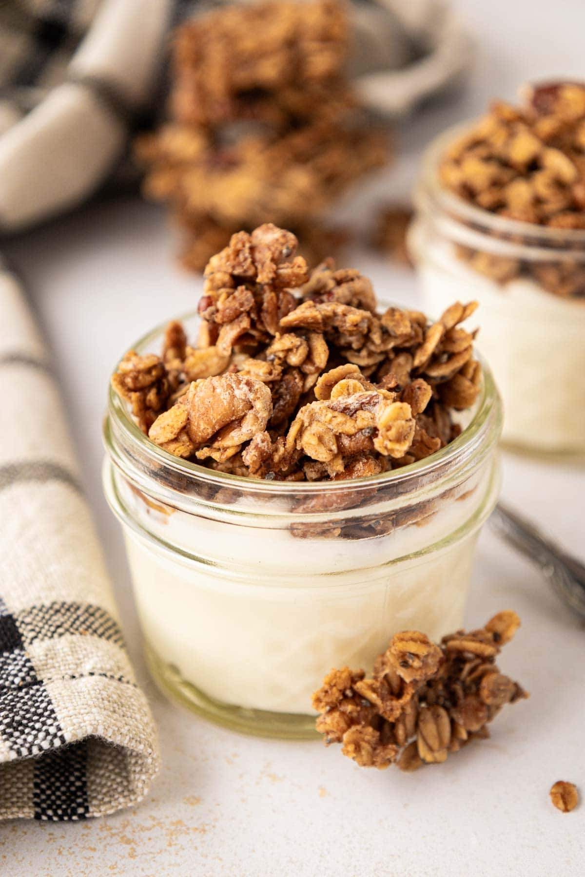 Yogurt cup topped with granola.